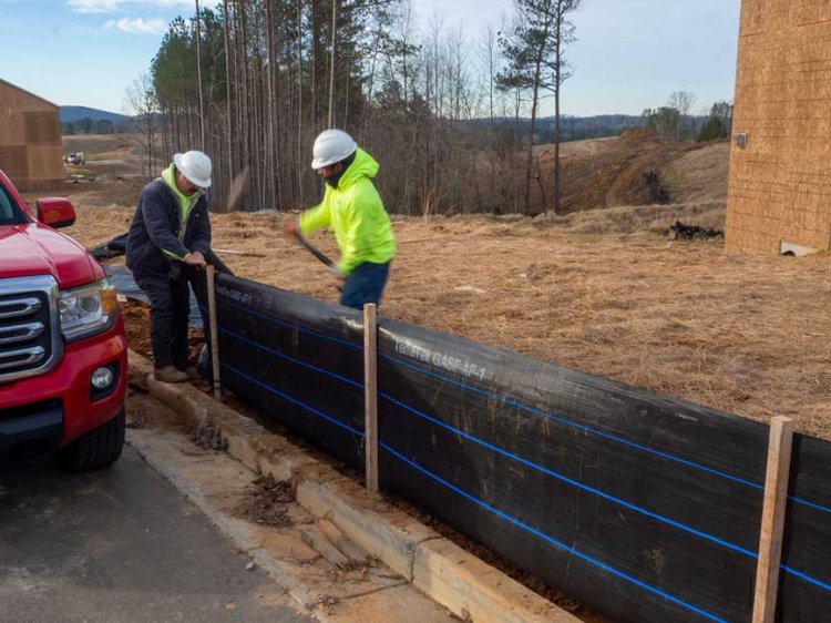 Silt fence installation for construction site